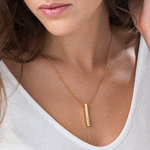 A Women Wear A Gold Personalised Bar Necklace